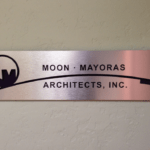 Custom routed brushed metal sign