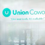 Union Cowork logo printed on frosted vinyl installed on Entry window