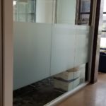 Standard Frosted Privacy Film installed on conference room glass for commercial real estate company