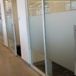 Standard Frosted Privacy Film installed on office glass for commercial real estate company