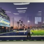 Football game photo on acrylic for Byrom Davey Construction