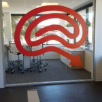 Identity Logo on conference room glass