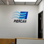 Custom Painted Logo Sign displayed at office entry