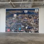 Wall Mural installation showing overhead shot of San Diego showing amenities close to office building for lease