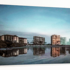 Acrylic Print in blue tones from photo of Coronado condominums taken from the beach at sunset.