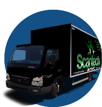 Scantech Graphic Boxtruck with vehicle wrap showing logo and slogan