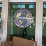 Northrop Grumman Logo installed on an interior lobby window.