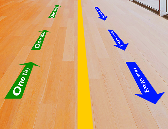 Stock and custom-printed floor graphics - Social Distancing Floor Graphics - colorful one-way arrows on wooden floor