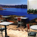 Wall Mural of a deep blue mountain reservoir installed on hospital cafe wall