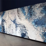 Close-up of abstract blue monochrome mural on S-curved wall