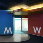 Dimensional Letters identifying men's and women's restrooms